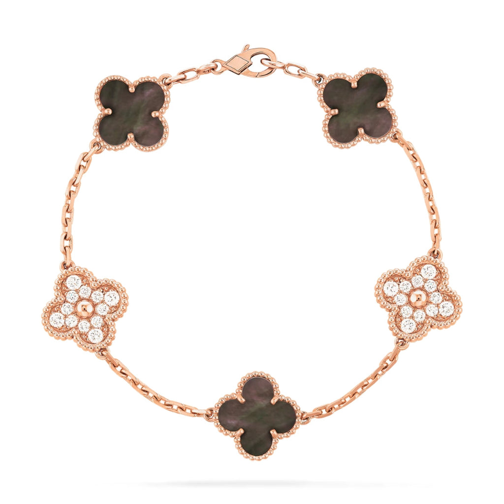 https://cdn.shopify.com/s/files/1/0679/7780/6117/files/VintageAlhambrabracelet_5motifsblackmopdiamond.jpg?v=1727641923