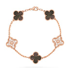 https://cdn.shopify.com/s/files/1/0679/7780/6117/files/VintageAlhambrabracelet_5motifsblackmopdiamond.jpg?v=1727641923