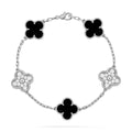 https://cdn.shopify.com/s/files/1/0679/7780/6117/files/VintageAlhambrabracelet_5motifsdiamondsonyxwhitegold.jpg?v=1727644267